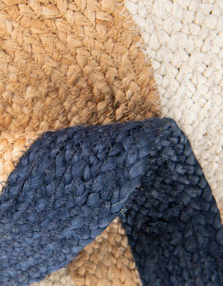 Detail image of  7' 10 x 7' 10  Hand Braided Jute Round Rug
