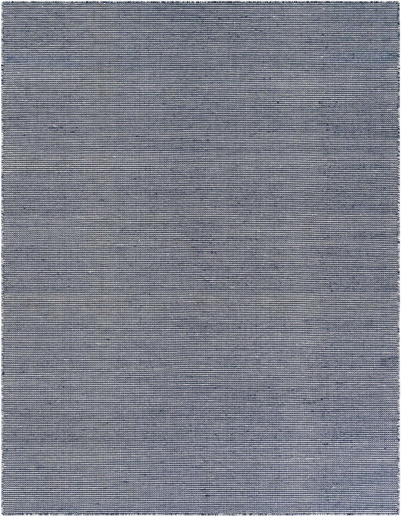 A 6x9 rectangular Jill Zarin Palm Springs Outdoor rug in Navy Sky, featuring a modern, textured flatweave pattern.