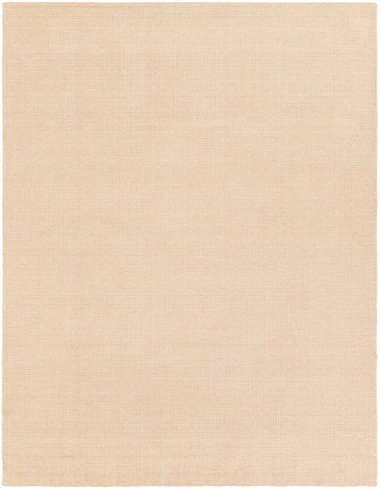 A 5x8 rectangular Jill Zarin English Manor rug in a solid oat beige color, showcasing its high, textured wool pile.