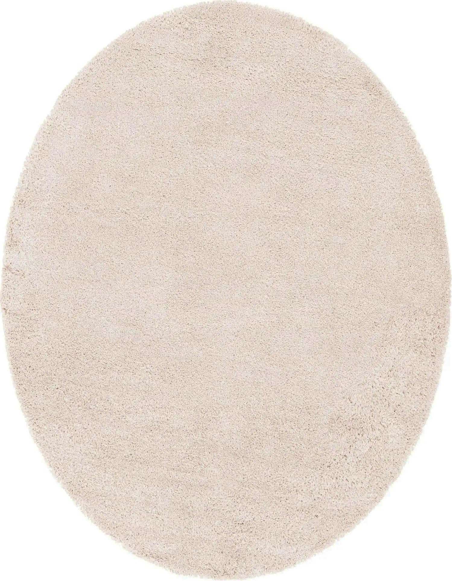 A 5' 0 round ivory shag rug with a textured pile, perfect for adding warmth to any indoor space.