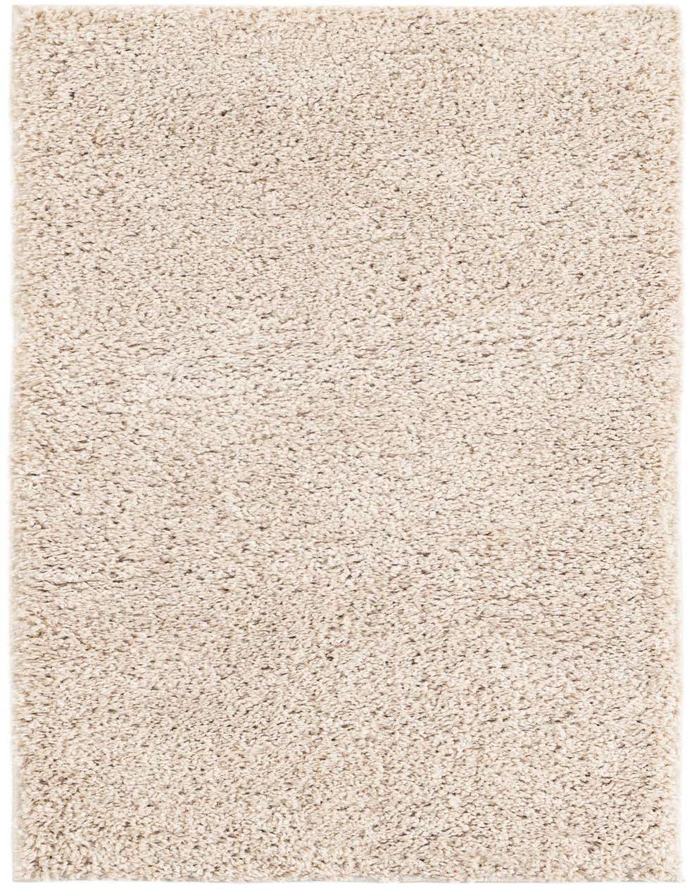 A 4 ft runner rug in a solid ivory and cream shag texture, perfect for a hallway.
