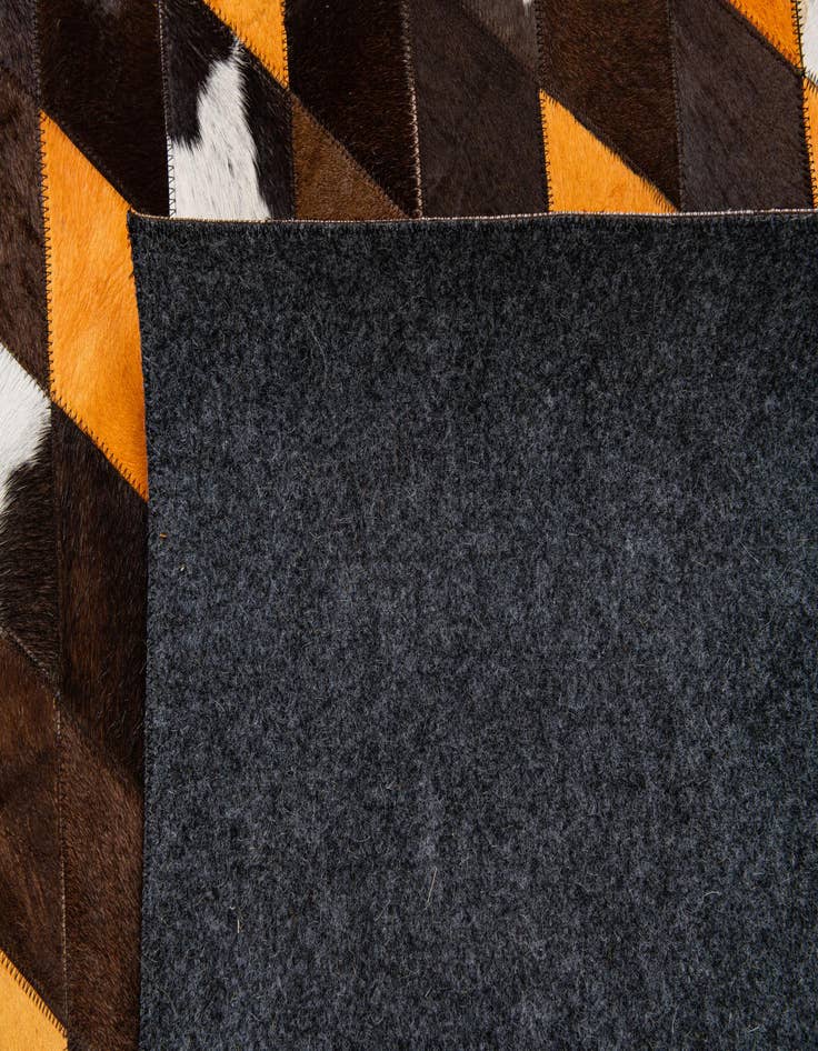 Detail image of  5' x 7' 11 Cowhide Stocks Rug