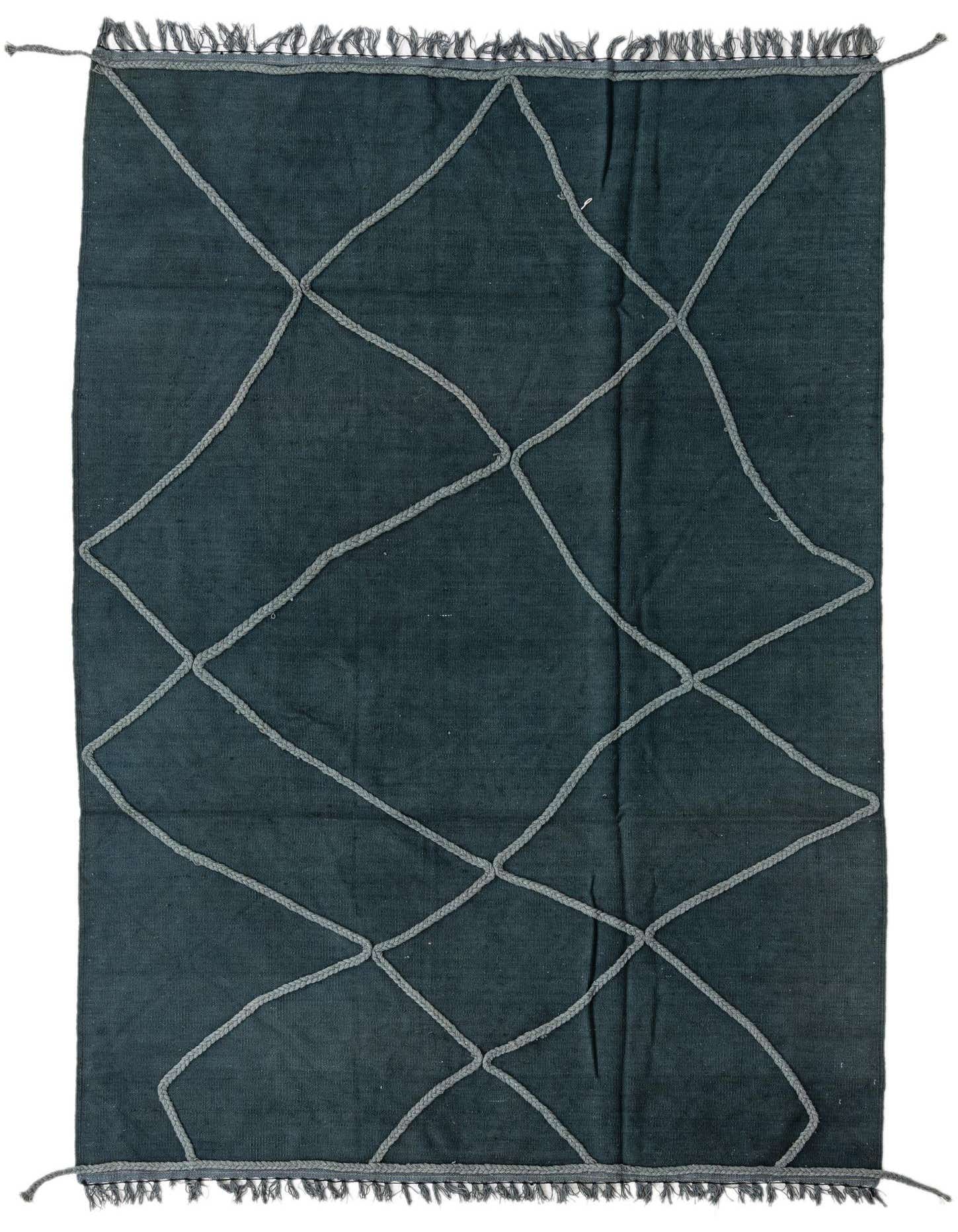 A 5x8 rectangular dark green flatweave wool rug with a light gray braided diamond pattern and fringed ends.