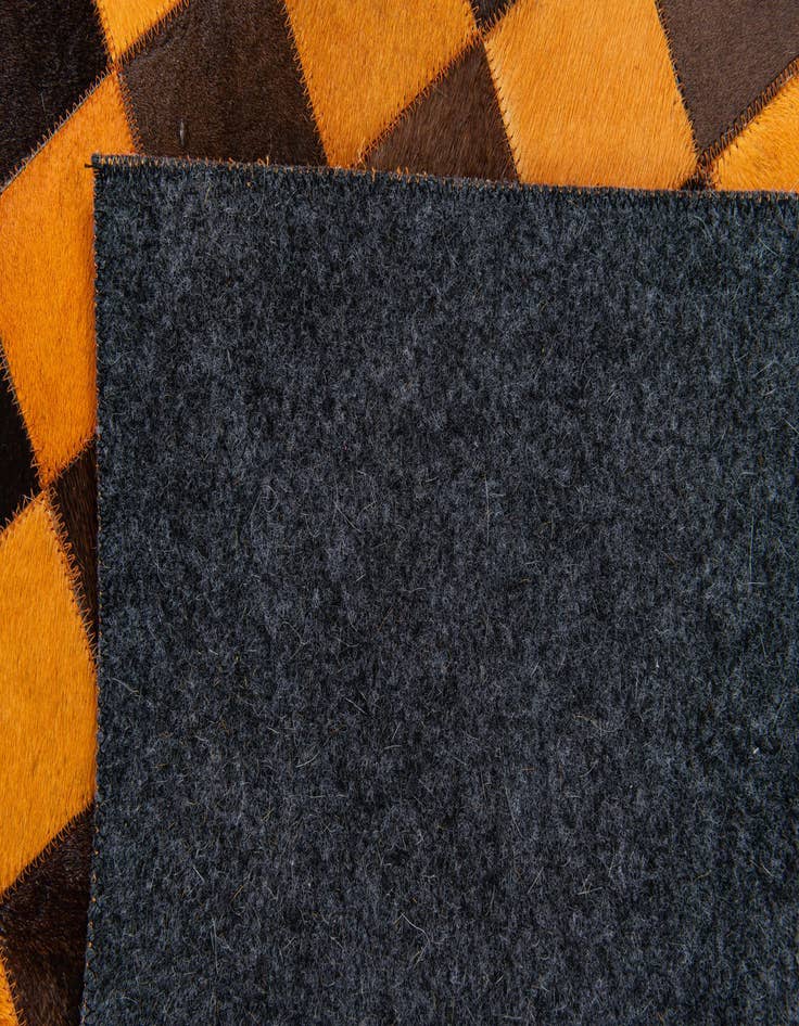 Detail image of  5' x 7' 11 Cowhide Stocks Rug