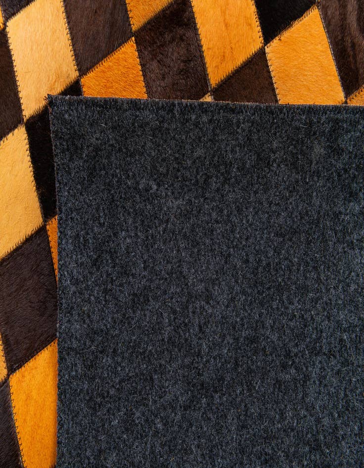 Detail image of  5' x 7' 11 Cowhide Stocks Rug