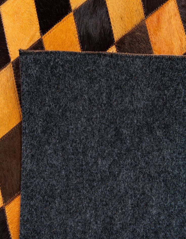 Detail image of  5' 2 x 8' Cowhide Stocks Rug