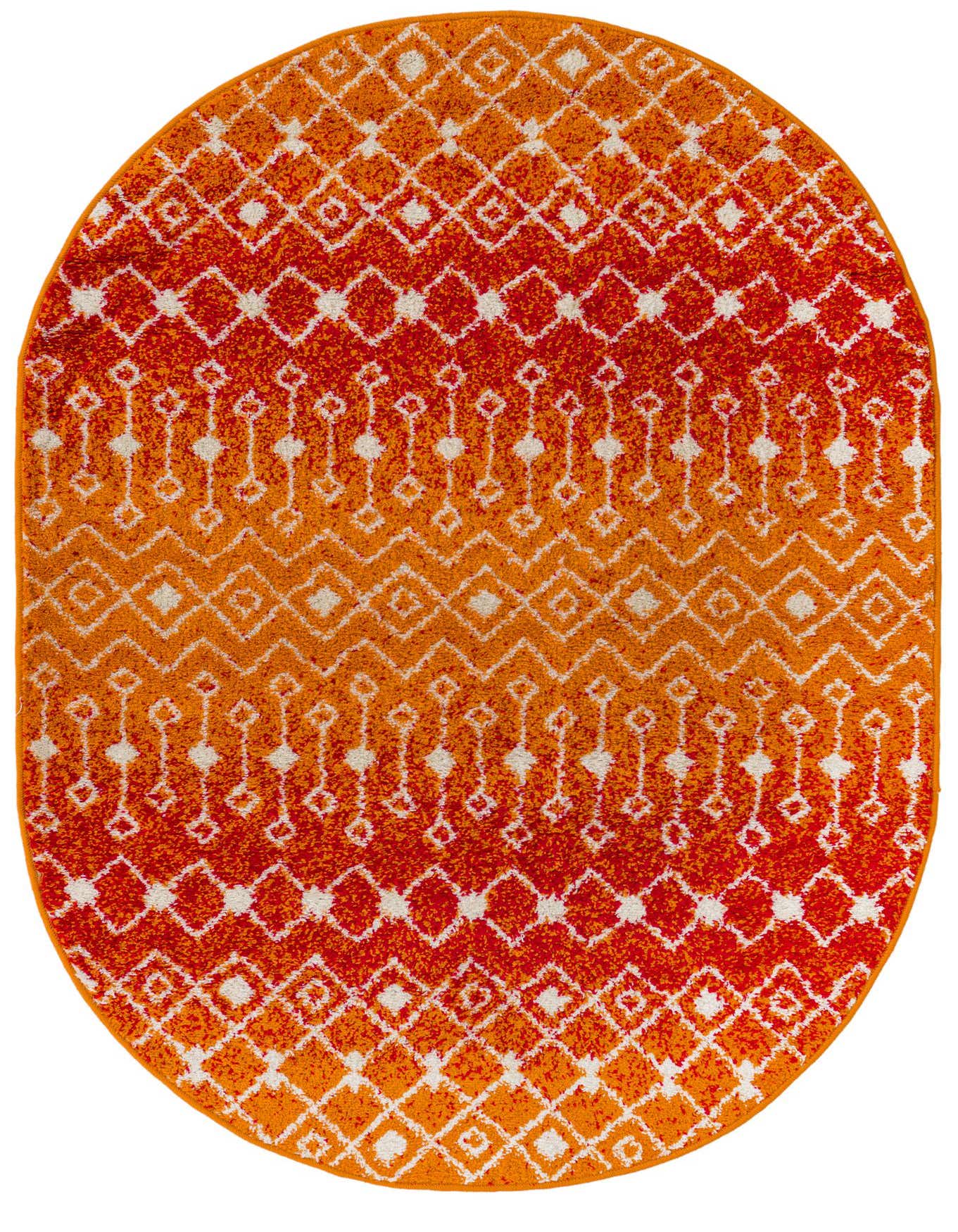 An oval 4'x6' orange and red bohemian rug with a white tribal trellis pattern, perfect for adding warmth to an indoor space.