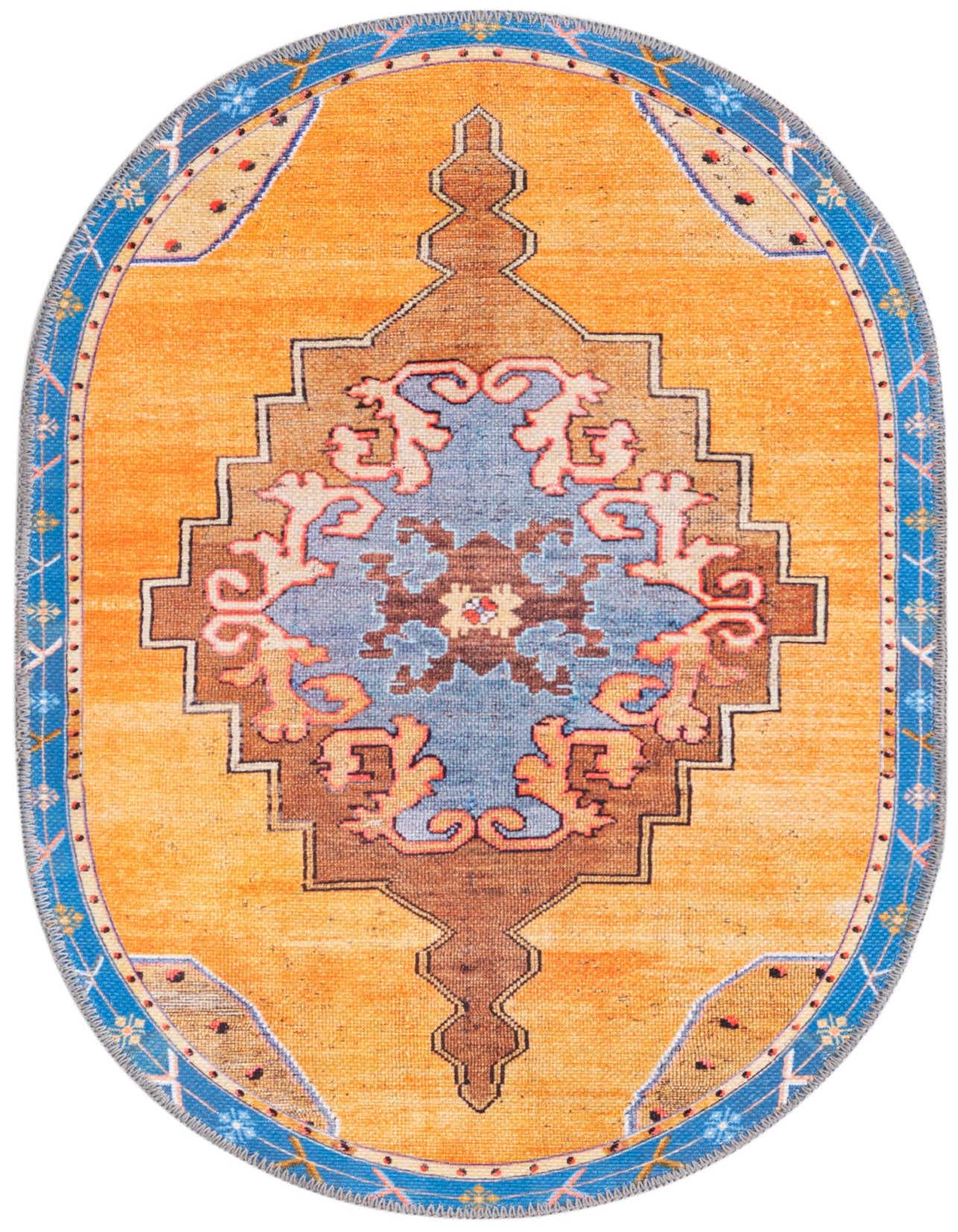 An oval orange rug with a central blue and brown medallion, framed by a blue border with geometric patterns.