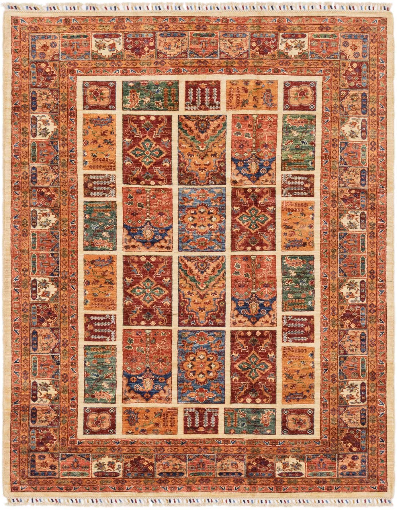 A 6x9 rectangular Rugs.com Ariana Ziegler rug featuring a traditional tribal pattern with diverse orange, red, blue, and green motifs on a cream background, surrounded by an intricate border.