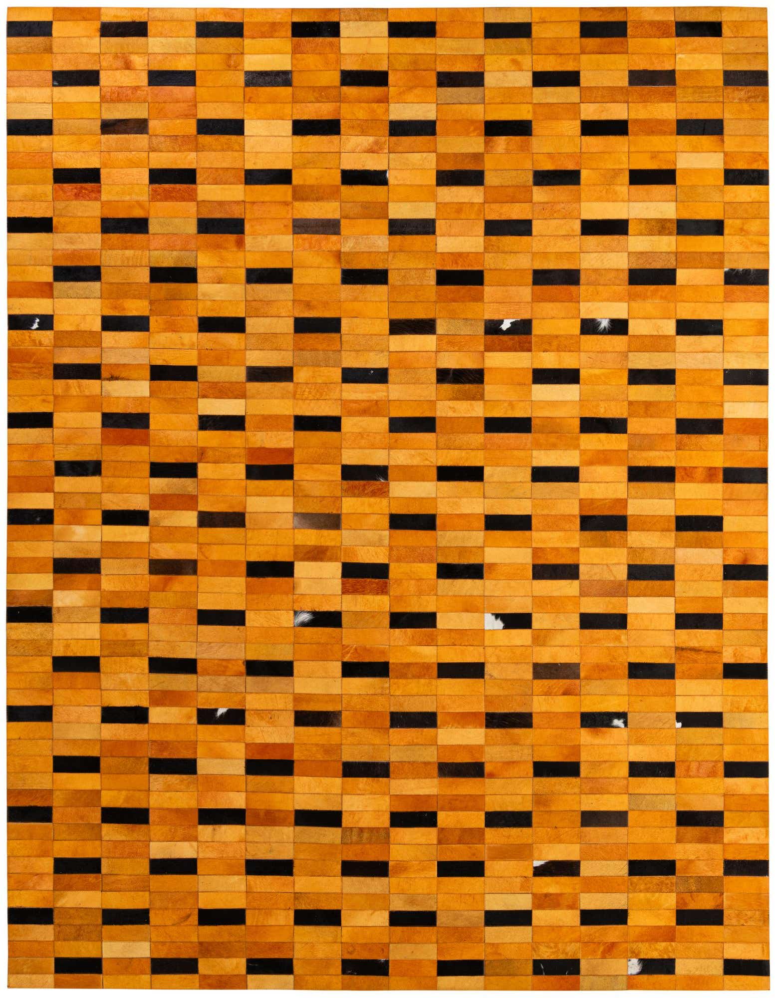 A rectangular 8x10 orange and black modern patchwork cowhide rug with a stripe pattern.