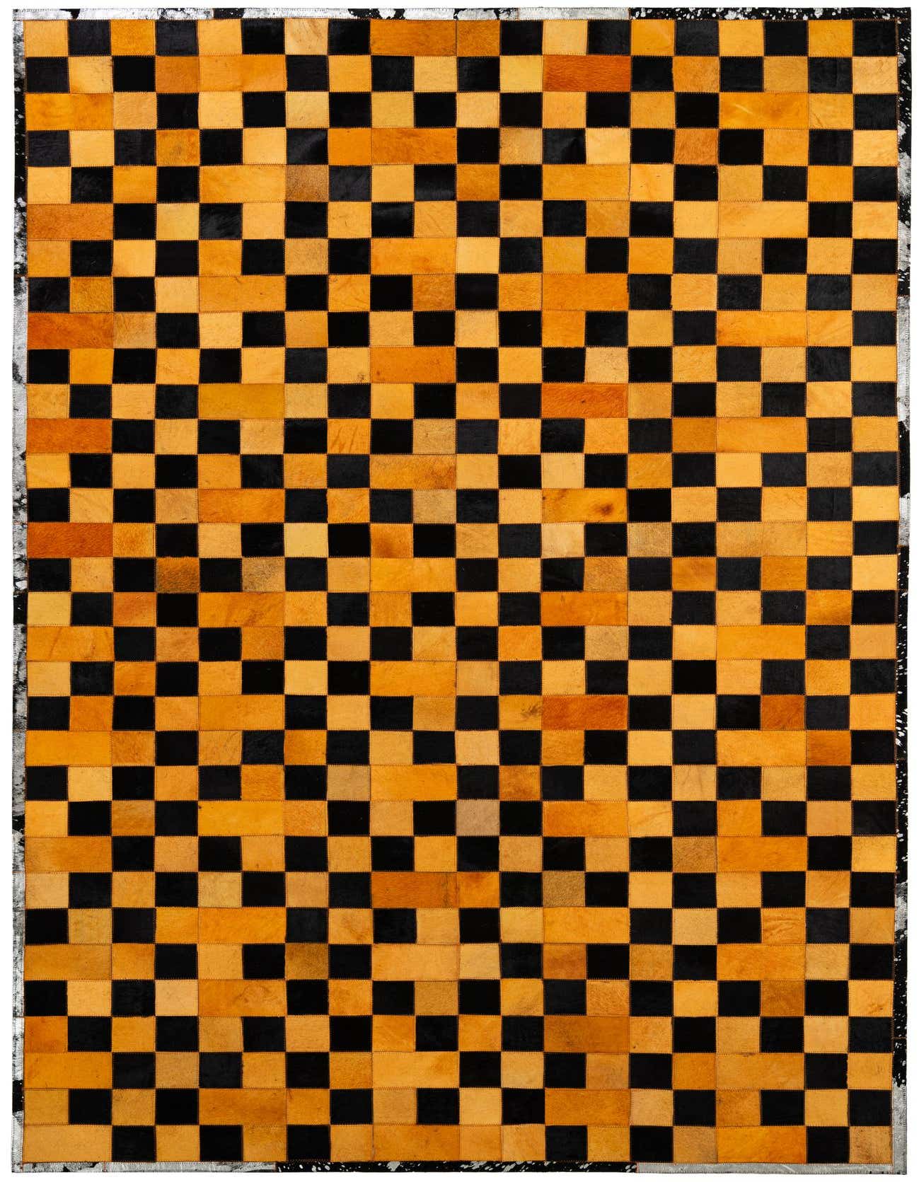 A 5x8 rectangular Cowhide Patchwork rug featuring a modern checkerboard pattern of alternating black and orange squares.