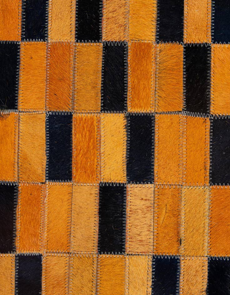Detail image of  5' 1 x 7' 11 Cowhide - Patchwork Rug