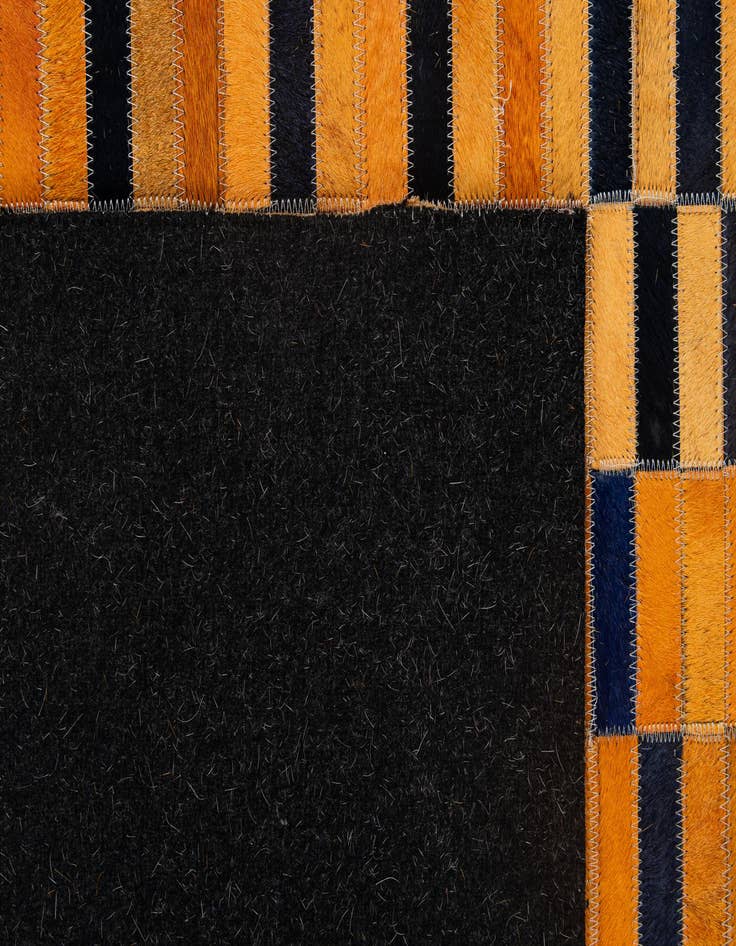 Detail image of  5' 1 x 7' 11 Cowhide - Patchwork Rug