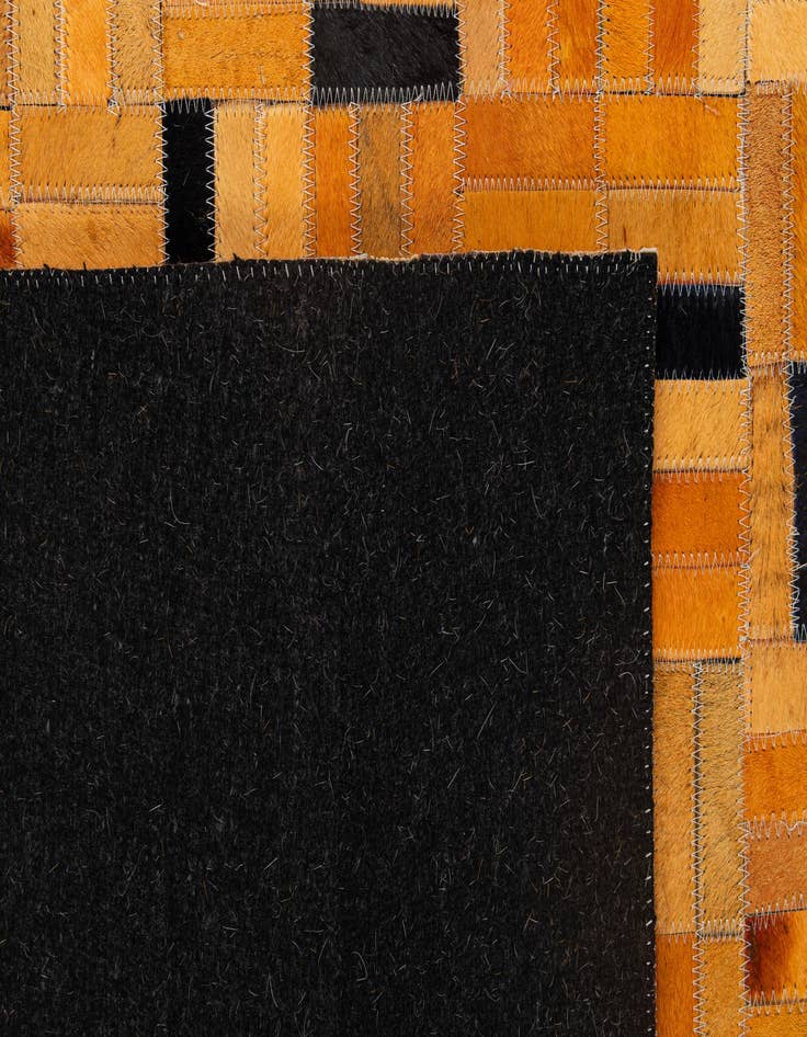 Detail image of  5' x 7' 11 Cowhide - Patchwork Rug