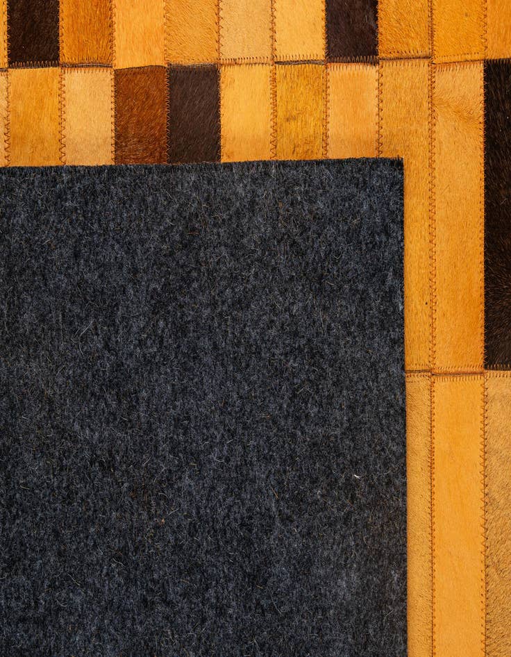 Detail image of  5' 1 x 7' 11 Cowhide - Patchwork Rug