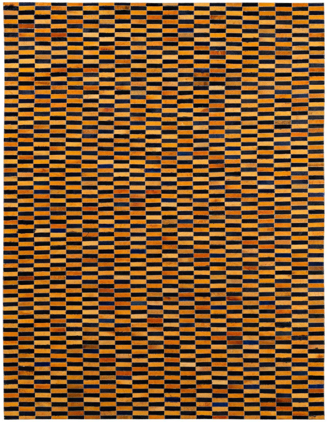 A rectangular 5x8 orange and black modern patchwork cowhide rug with a striped pattern, suitable for a living room.