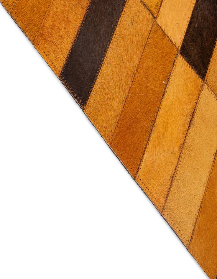 Detail image of  5' 1 x 7' 11 Cowhide - Patchwork Rug