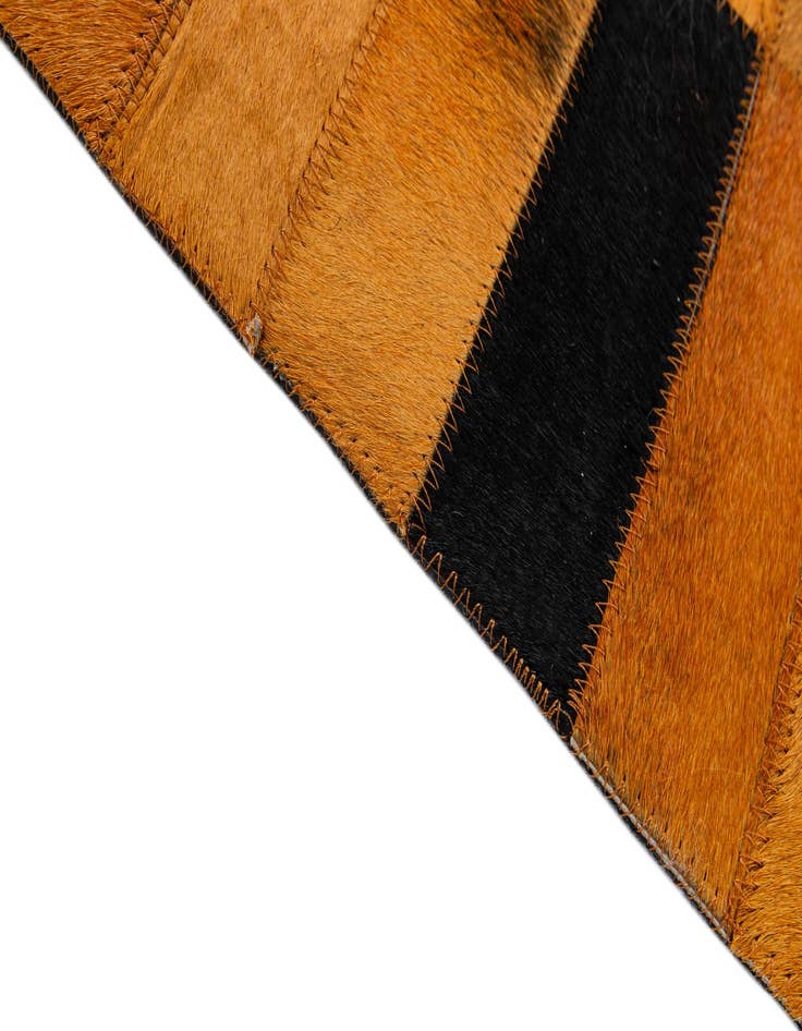 Detail image of  4' 11 x 8' Cowhide - Patchwork Rug