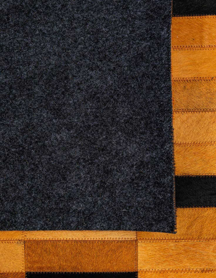 Detail image of  4' 11 x 8' Cowhide - Patchwork Rug