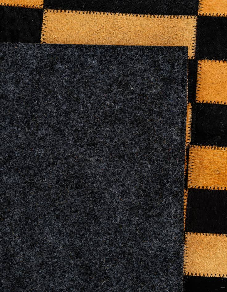 Detail image of  4' 11 x 8' Cowhide - Patchwork Rug