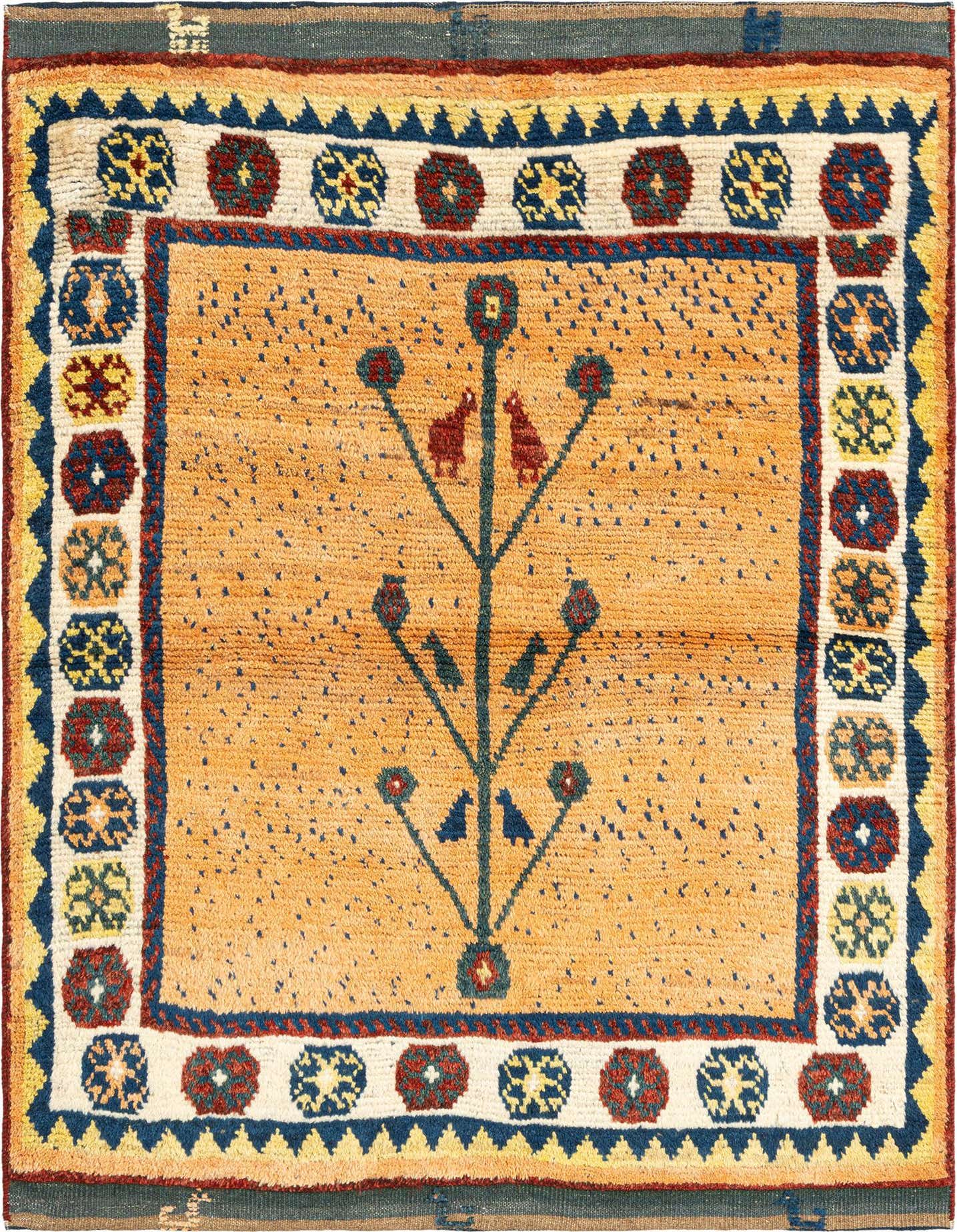 A 3x5 rectangular Gabbeh rug in orange, featuring a central tree-of-life motif with birds and a decorative border.