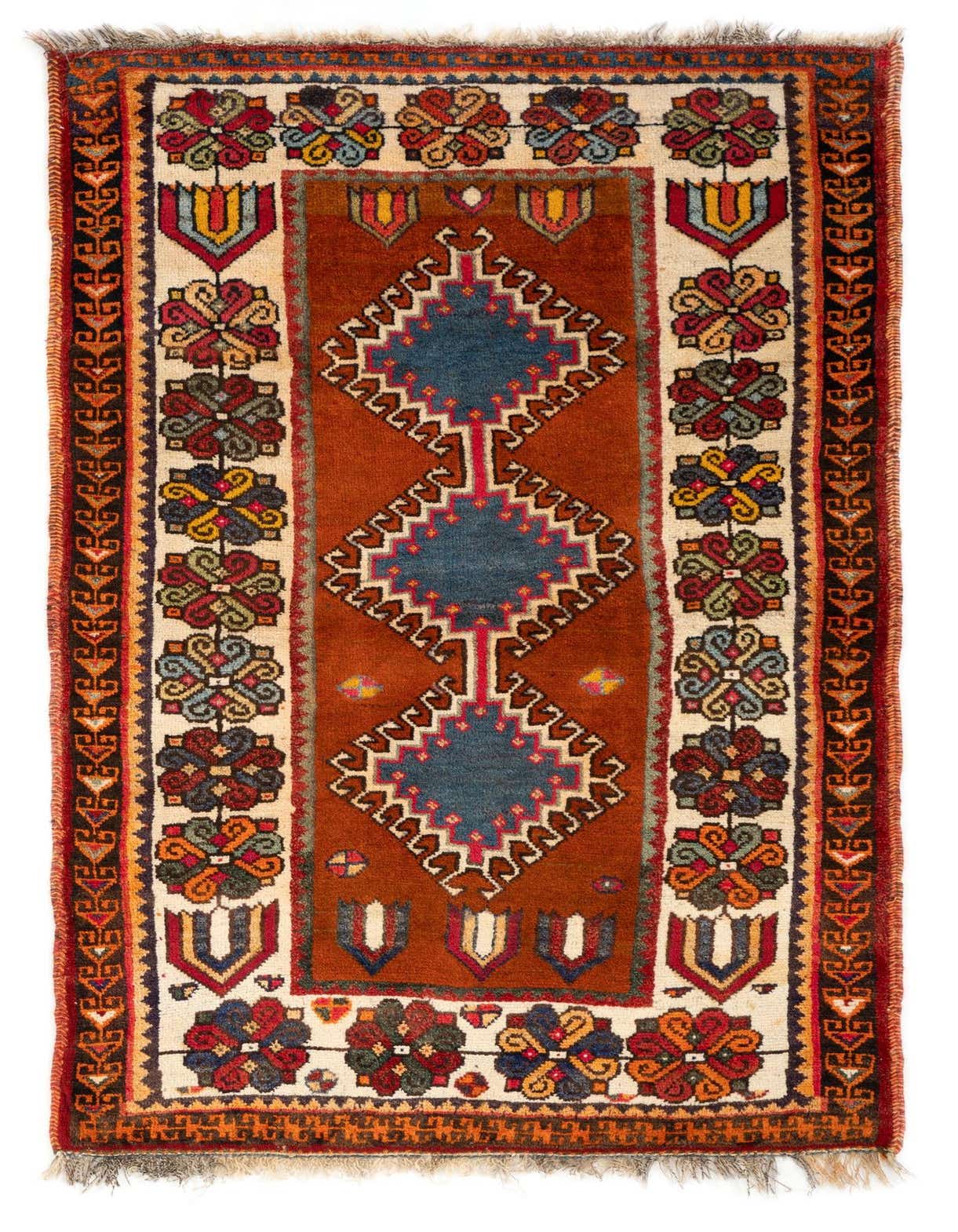 A 3x5 rectangular Gabbeh rug featuring a rich orange field with three central blue diamond medallions and a border of colorful floral and geometric patterns.