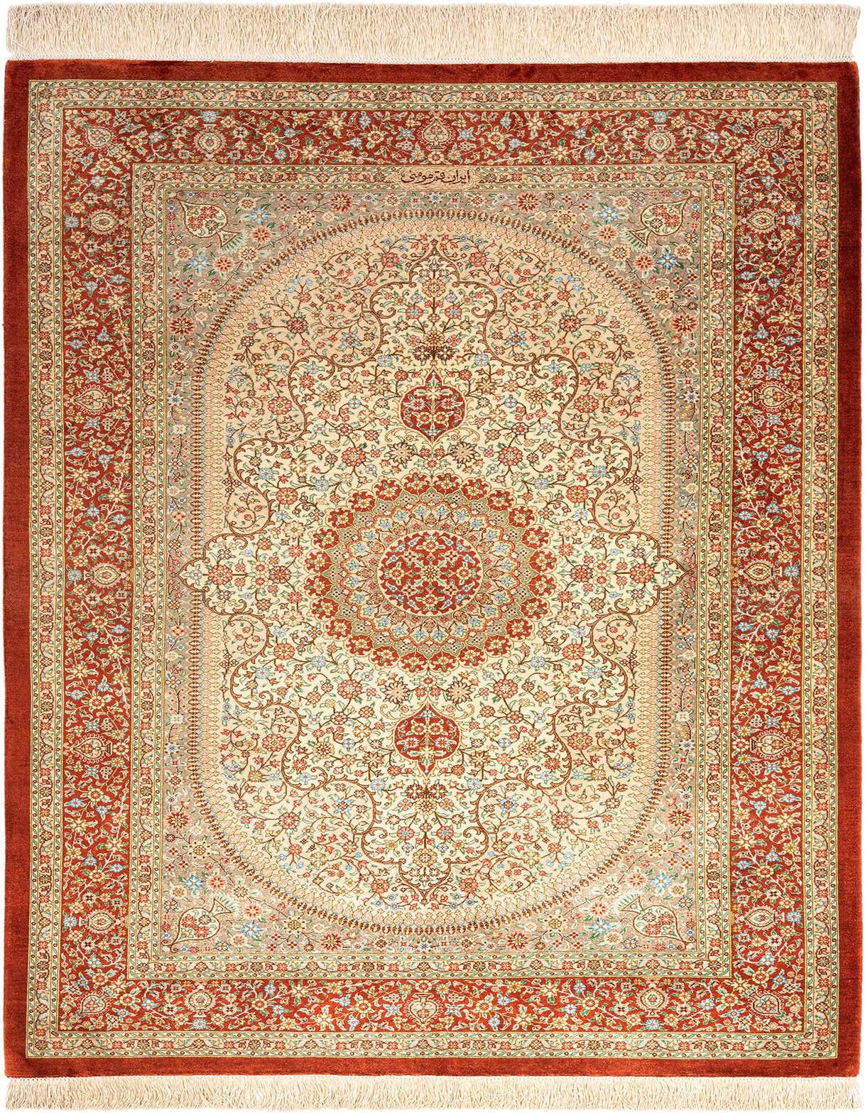 A 3x5 rectangular Ghom Silk Persian rug featuring a central medallion and intricate floral patterns in shades of orange, cream, and blue.