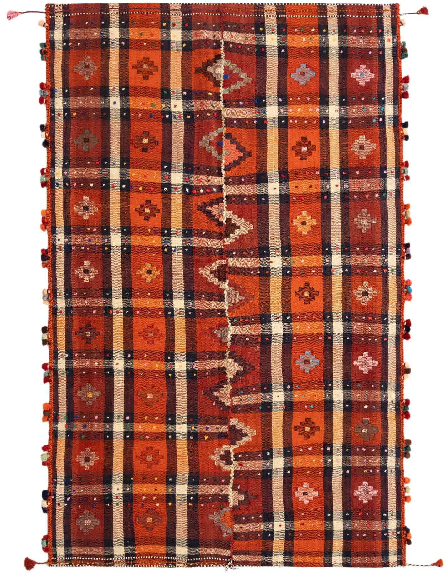 A 5x8 rectangular Jajim rug in shades of orange, red, and navy with a plaid pattern and colorful tassels.