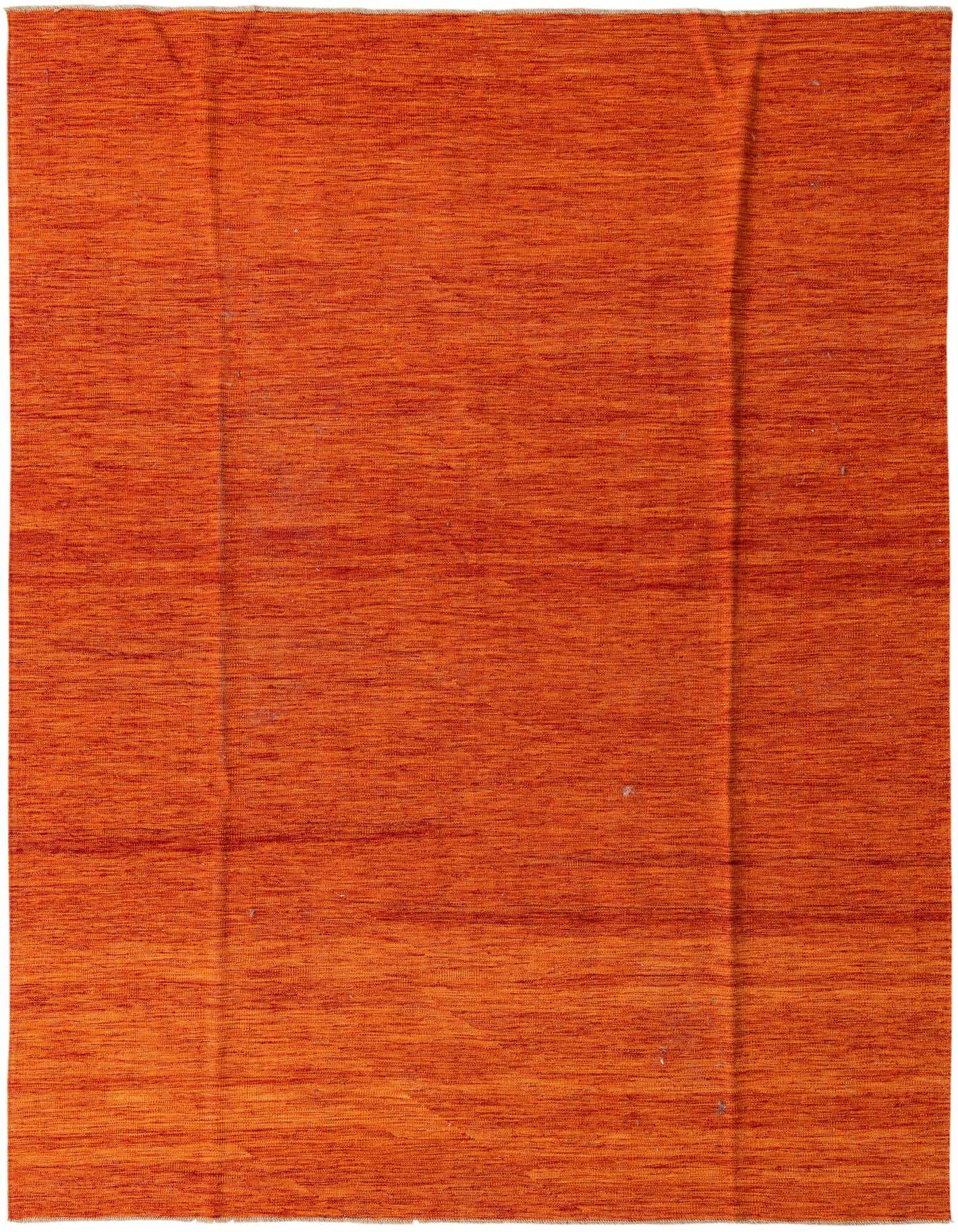 A 7x10 rectangular flatweave Kilim Modern rug from Rugs.com, featuring a vibrant orange hue with subtle tribal variations, ideal for a living room or dining area.