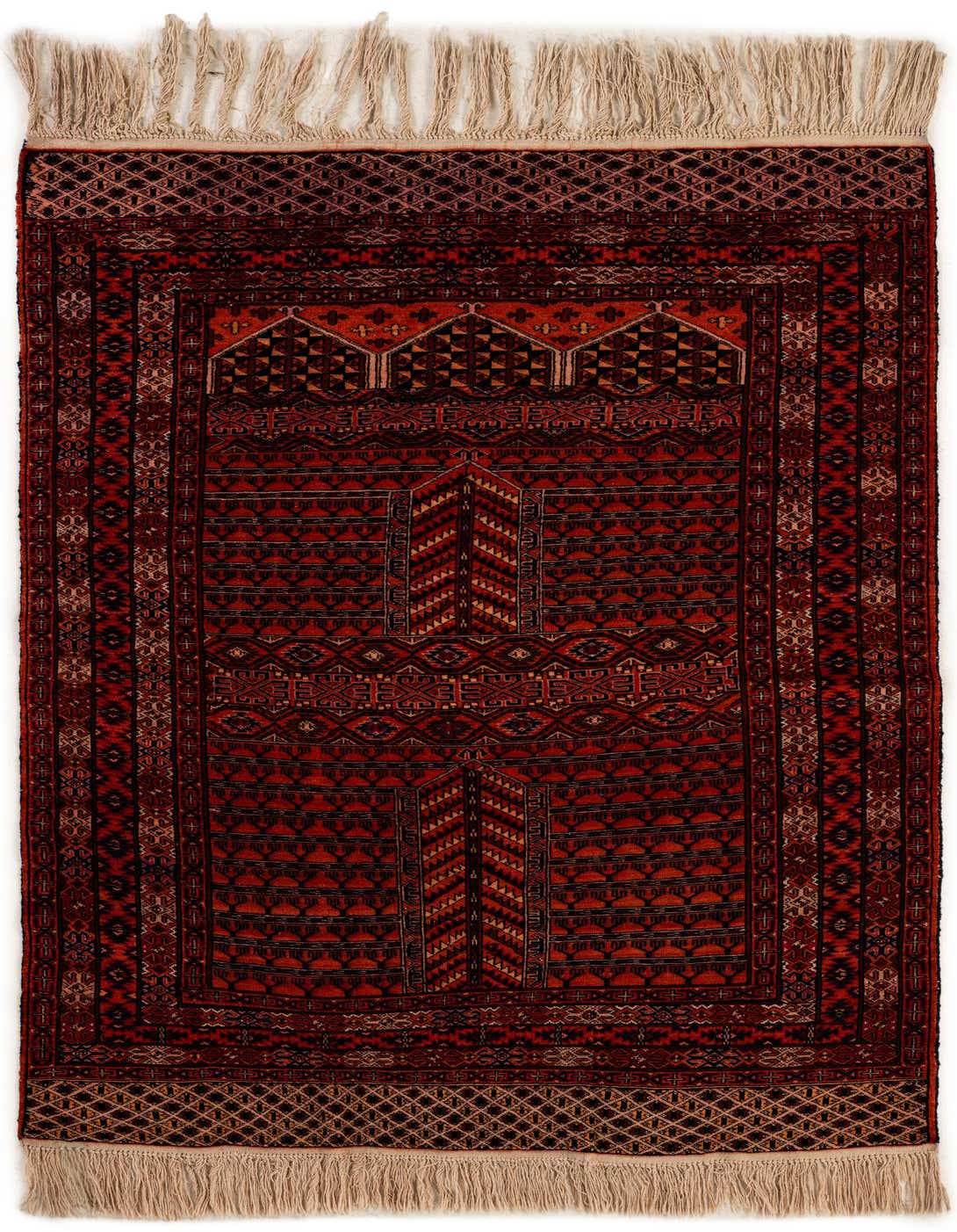 A 4x6 rectangular Lahour rug with a traditional Oriental pattern in shades of orange, red, and black, featuring intricate geometric motifs and a fringed edge.