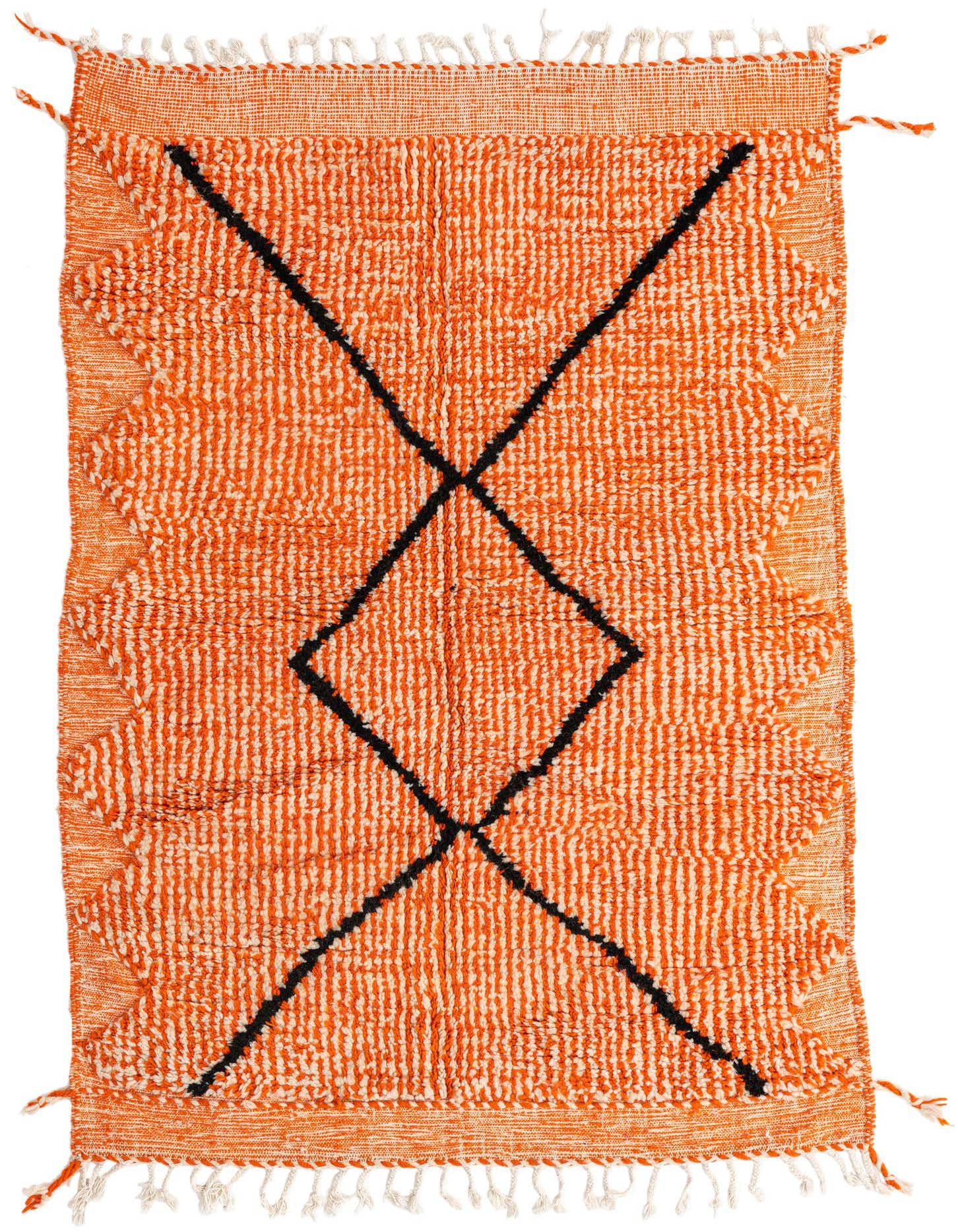 A 4x6 rectangular orange shag rug with a bold black tribal diamond pattern, featuring white fringe.