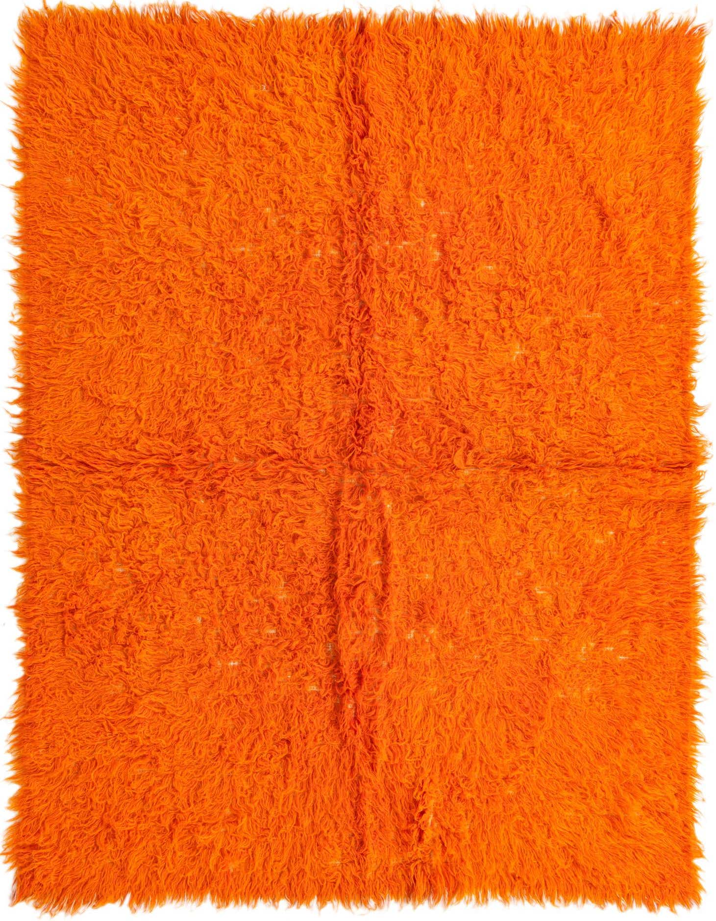 A vibrant 5x8 rectangular orange shag rug, handmade from wool, featuring a plush, textured pile.