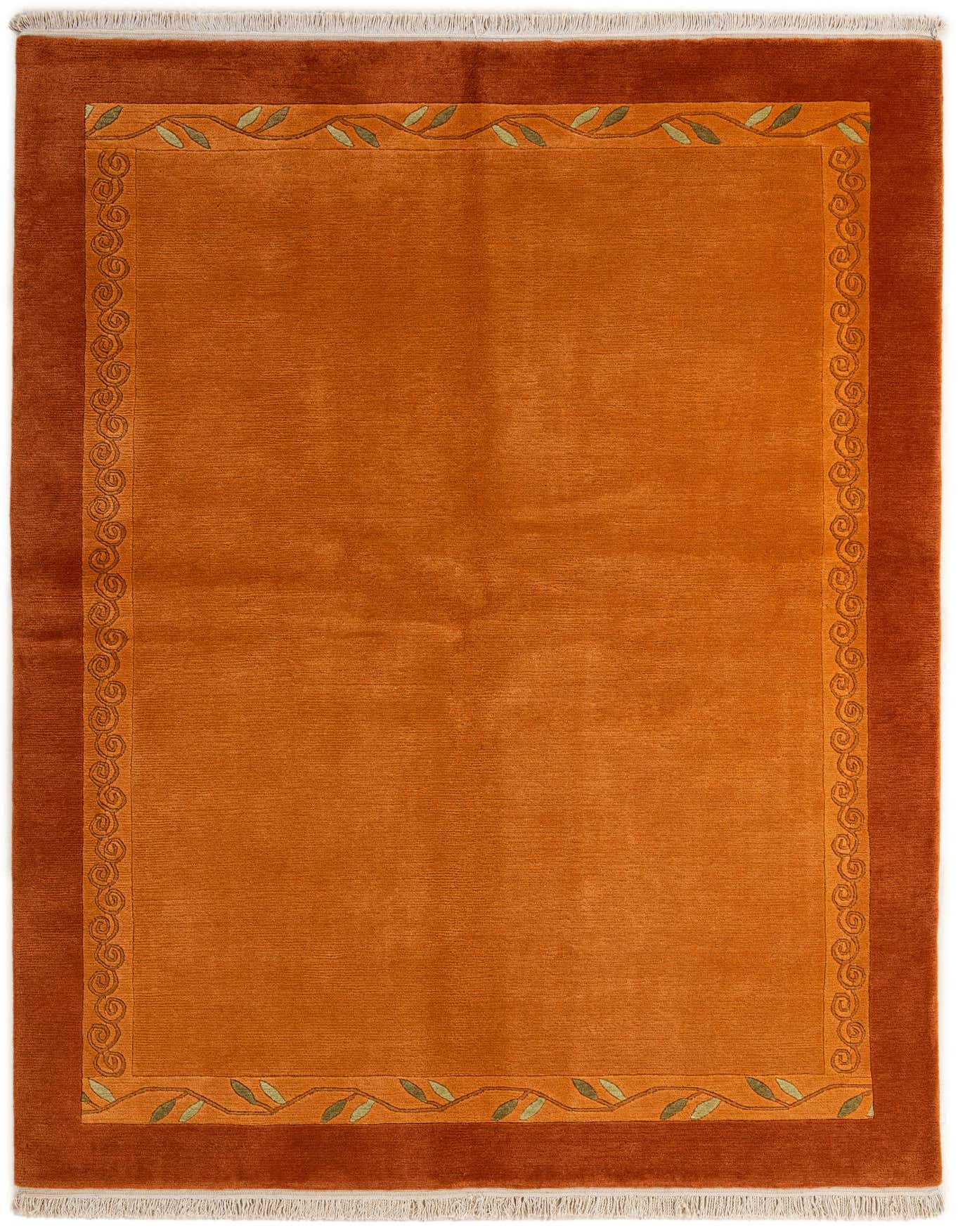A 5x8 rectangular orange wool rug with a darker orange border featuring a subtle scroll pattern and a delicate green leaf vine.