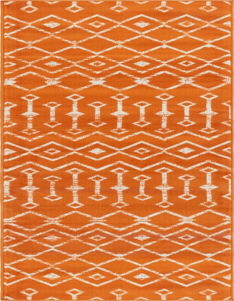 An 8 ft runner rug in a vibrant orange hue with a distressed white tribal trellis pattern, ideal for a hallway or kitchen.