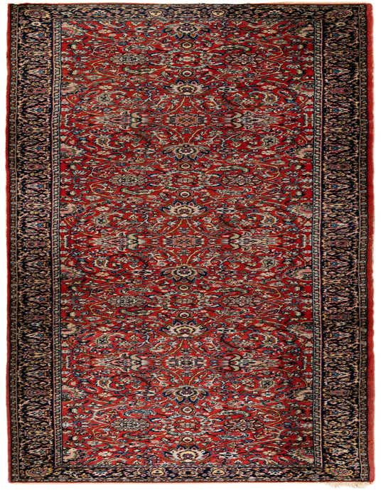A handmade 11 ft wool runner rug in traditional Oriental style, featuring a rich orange field with intricate floral and paisley patterns and a dark border.