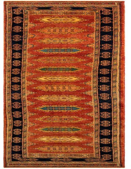 A 13 ft Luribaft Persian runner rug in warm orange with intricate navy blue and gold traditional patterns, ideal for a hallway.