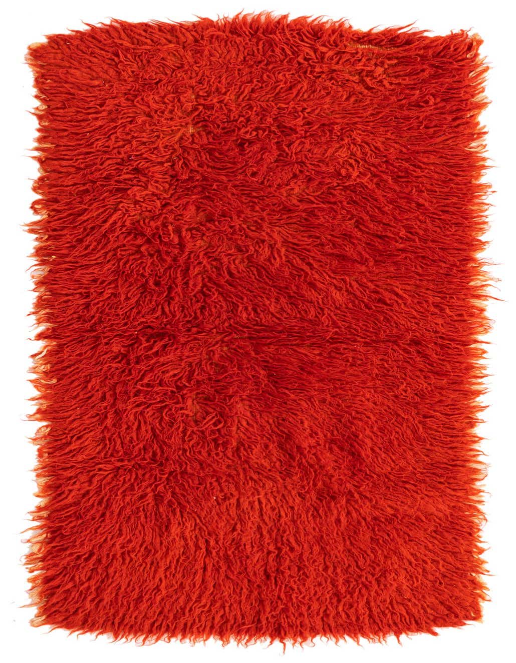 A vibrant orange 5 ft wool shag runner rug with a tribal texture, perfect for a hallway.