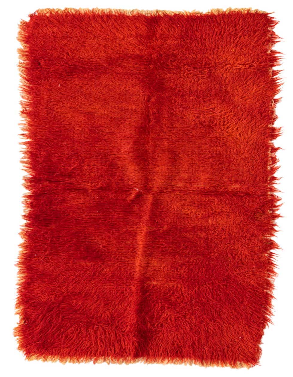A vibrant orange 5 ft Moroccan shag runner rug, handmade from wool, perfect for a hallway.