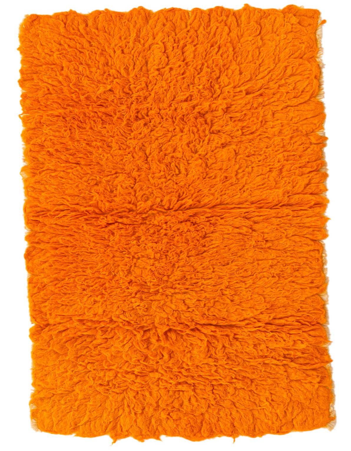 A vibrant orange 4 ft runner rug with a plush, shaggy texture, perfect for adding warmth to a hallway.