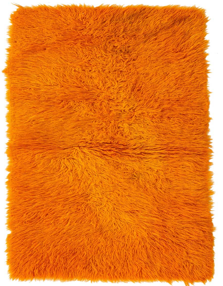 A vibrant orange 5 ft runner rug with a plush, shaggy texture, ideal for a hallway.