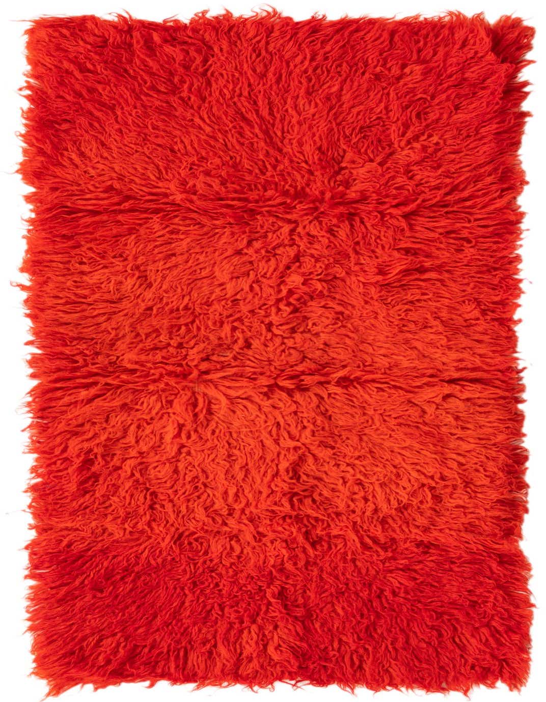 A vibrant orange 4 ft runner rug with a plush, shaggy texture, perfect for a hallway.