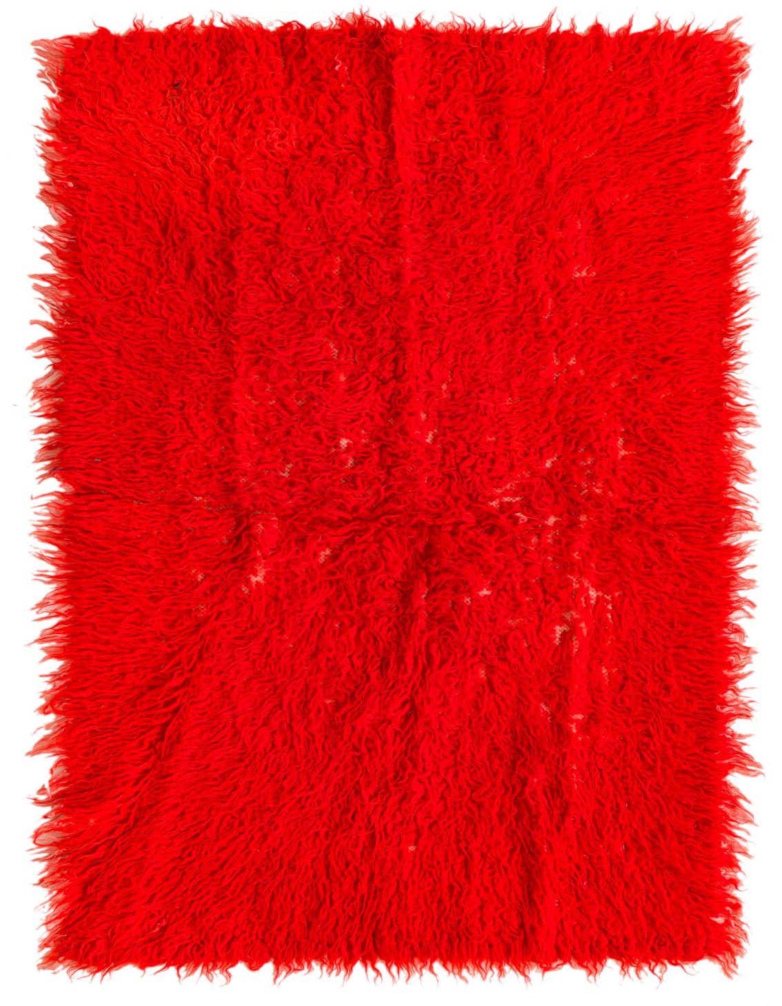 A vibrant orange 4 ft runner rug with a thick, shaggy pile, handmade from wool, perfect for a hallway.