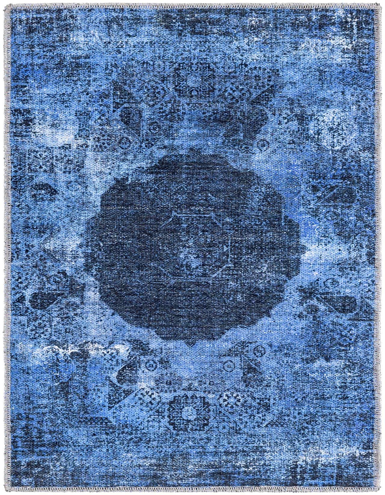 A 2x3 rectangular Yara rug in varying shades of blue, featuring a distressed traditional medallion pattern, ideal for a kitchen or entryway.
