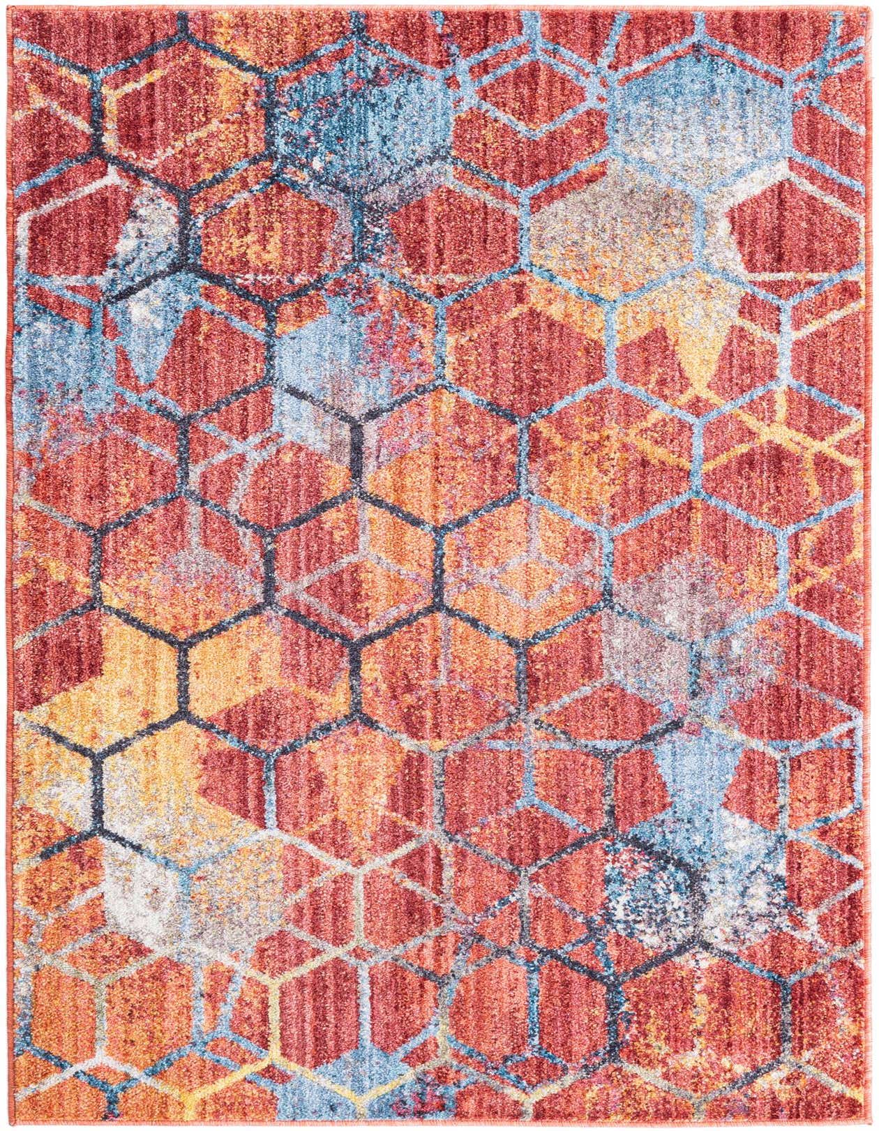 A 3x5 rectangular modern rug featuring a distressed hexagonal pattern in shades of orange, blue, and hints of gray.
