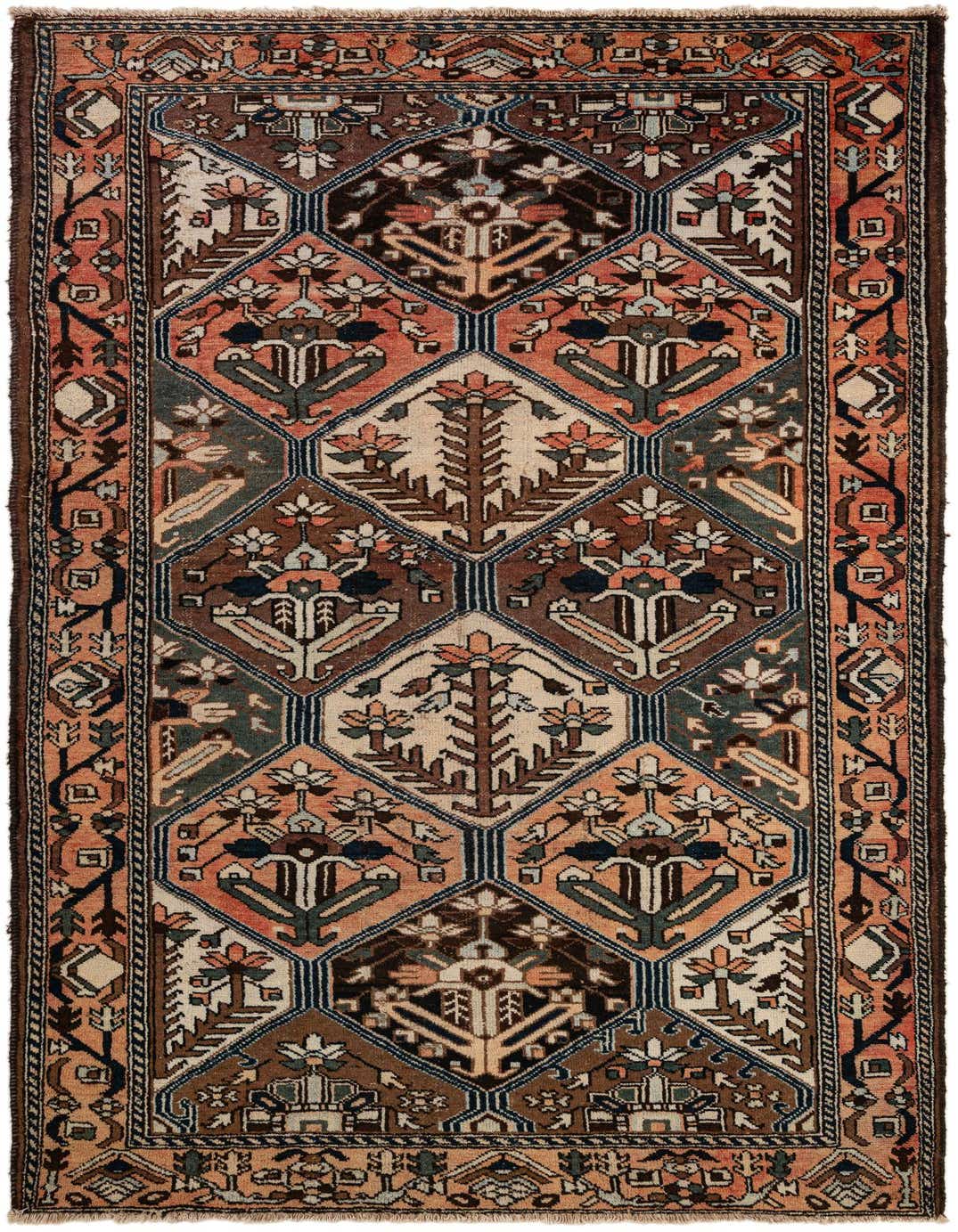 A 7x10 rectangular Bakhtiar rug featuring a tribal Persian pattern in shades of orange, brown, and cream with blue accents.
