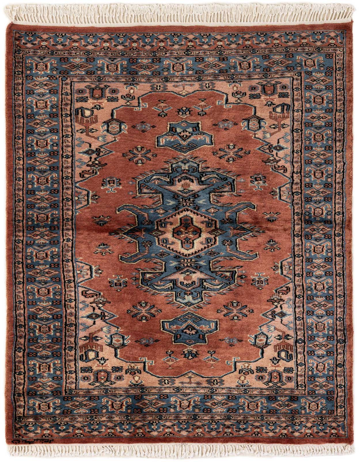 A 3x5 rectangular orange tribal Bokhara rug with a central medallion design and blue accents, featuring white fringe.
