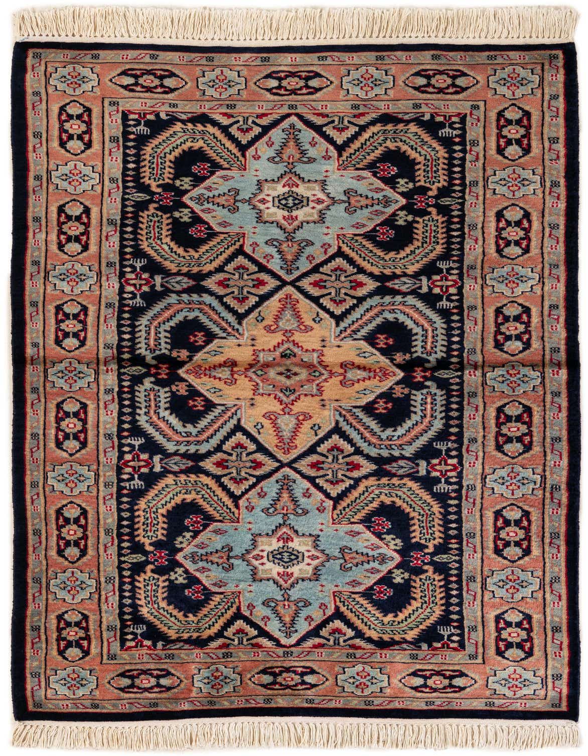 A rectangular 3x5 Bokhara rug featuring a central medallion and tribal patterns in shades of orange, blue, and black, with white fringe.