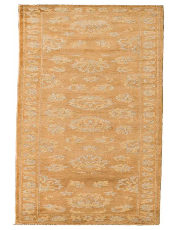 A 10 ft runner rug in shades of orange with an oriental transitional pattern, ideal for a hallway.