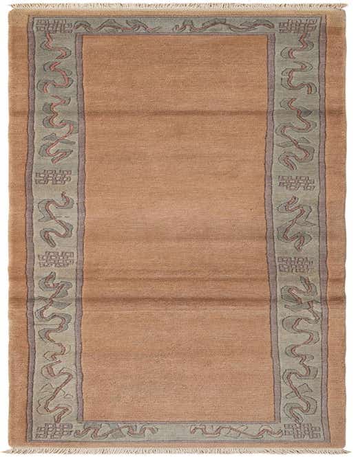 A 10 ft orange wool runner rug with a modern oriental border in muted green, purple, and red, suitable for a hallway.