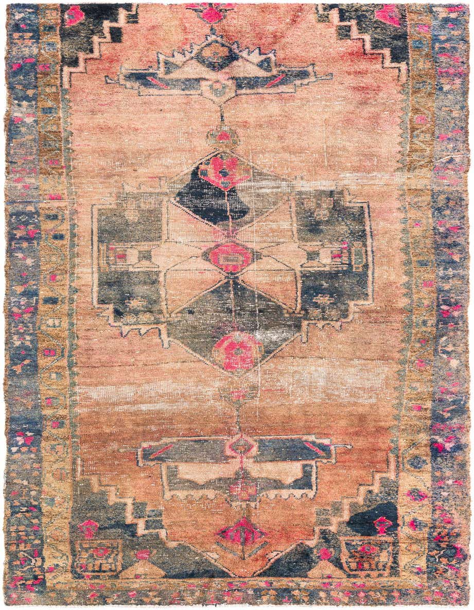 A 10 ft runner rug with a distressed Persian medallion pattern in shades of orange, blue, and pink, ideal for a hallway.